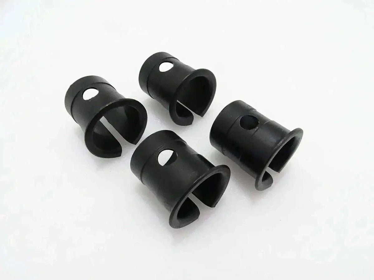 Set of four black cylindrical bushings for machine linkage