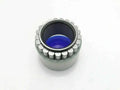 Jcb hub roller bearing with exposed rollers and blue inner grease