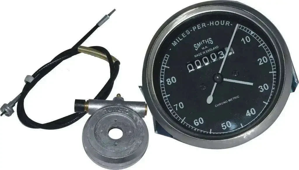 Black-faced analog speedometer with chrome bezel, cable and mounting ring